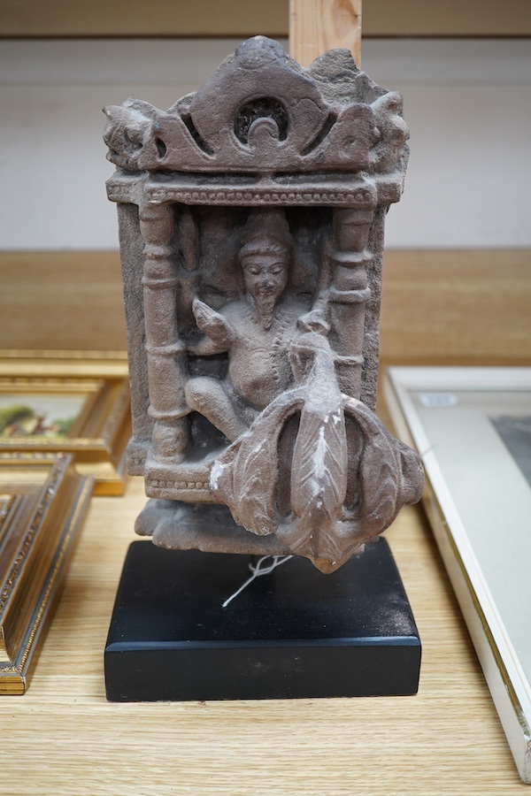 An Indian Hindu sandstone carving of Brahma the Creator, 14th century. 33cm total. Condition - commensurate with age